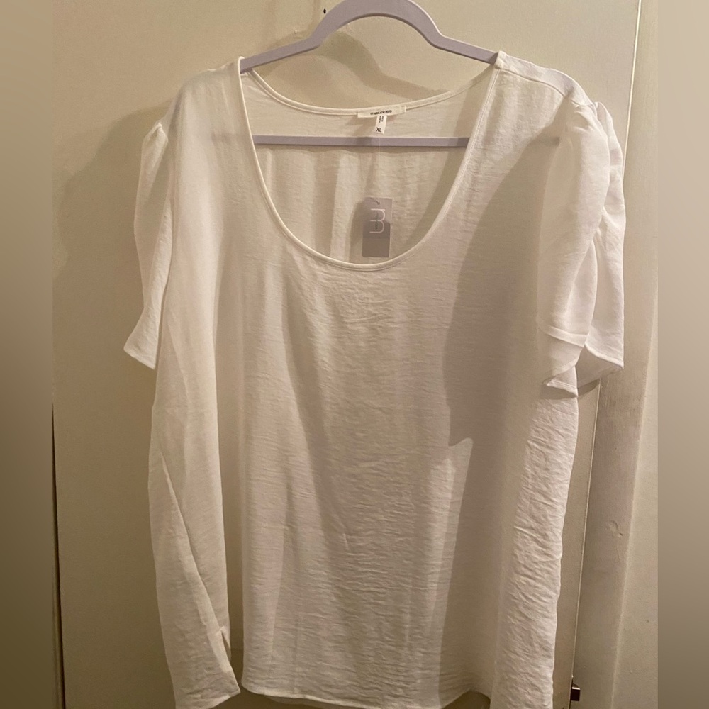 New with tags. Maurices Extra large white blouse. Ruched sleeves